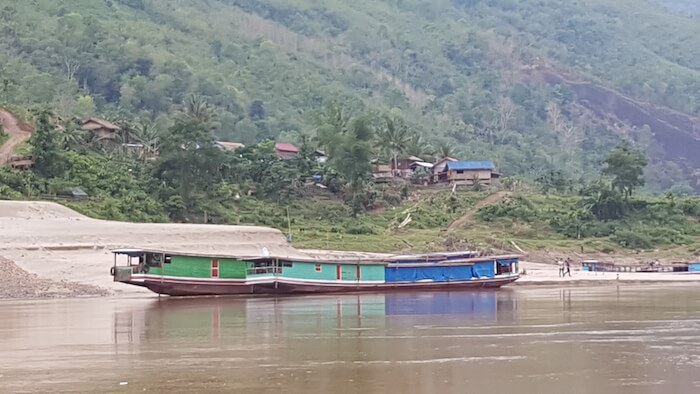 Long boats at a small village.