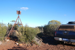 Survey marker at the top of Mount Holland.