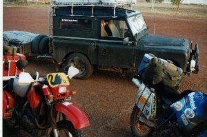 Two bikes and an old Land Rover.