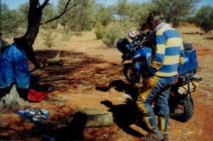 Found some shade under which George repaired the fuel tank.
