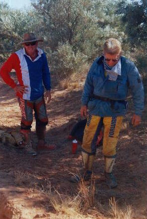 Standing with broken leg.