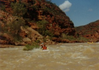 Adrian and Kim look on while Greg and Brent negotiate a rapid on the way back to The Loop.