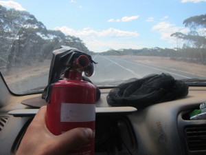 Fire Extinguiser in hand.