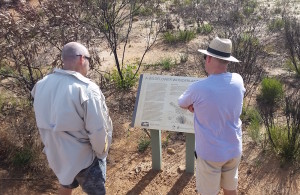 Graham and Jeff reading about the Wildflower Wonderland.