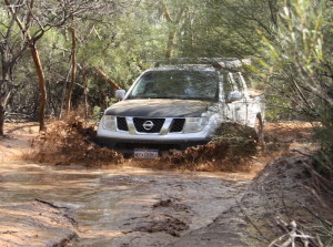 Tony takes his Navara through the water.