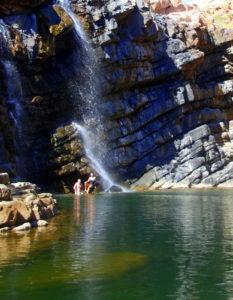 Kim and Tammy under the falls.