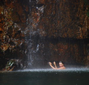 Under the waterfall