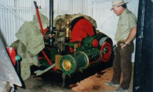 Kim inspecting engine