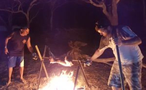 Joe and Paul turning piglet.