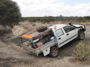 Kim takes his Rodeo through a gutter.