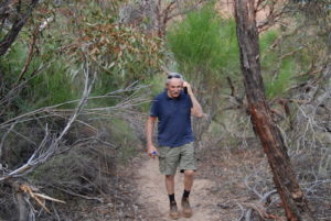 Cliff in touch with the home front while visiting Montys Pass