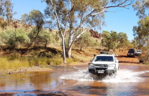 Greg and Margot in their Colorado through Fortescue River.