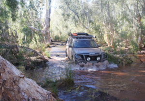 Joe takes the Y62 through a pool at Skull Springs.