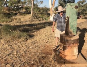 Kim at water pump.