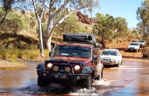 Nick and Carrie take their Jeep through the Fortescue River.