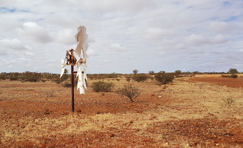 White windmill marks the turn to Erong Road.