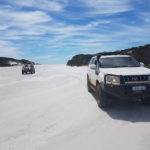 Dan's Prado and Adi's Jimny at St Mary River mouth.