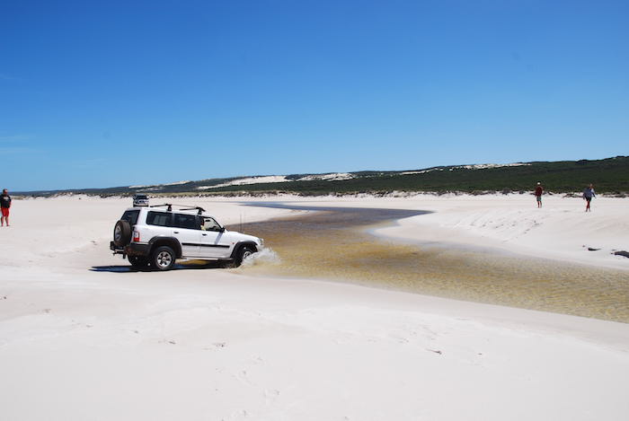 Crossing the Warren River on Warren Beach.