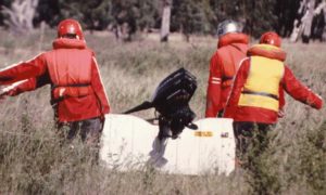Carrying the boats around Cunningham Weir.