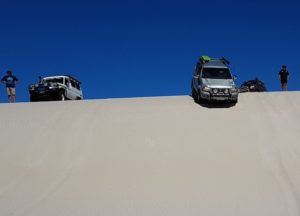 Jeff and Micaela in their Prado descend the dune.