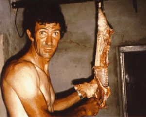 Roly butchered the pig for the pot.