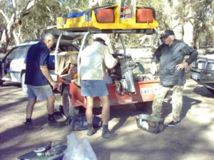 Motor repairs at Mulcra Island camp.