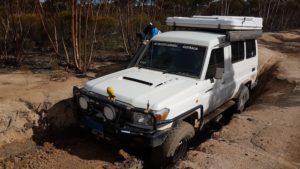 Troopy in deep gutter.