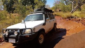 Mike and Sue in their Nissan Patrol exit the river.