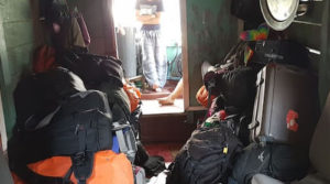 Luggage storage near the rear of the Slow Boat.