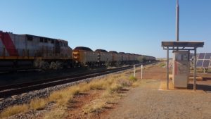 Iron ore train from Yandicoogina at Pannawonica Road Rail Crossing.