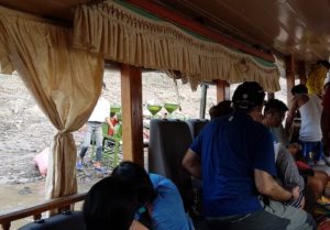 Offloading rice machine.