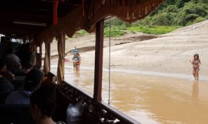 Passenger pickup at an isolated village.