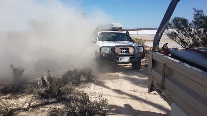 Mike and Sue in their Patrol exit the powdery blowout.