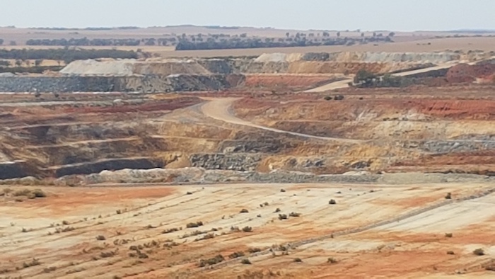 Discovered in the 1940s, major mining started in 1948. Western Mining Corporation acquired the mine in the 1970s and commenced open cut mining in 1989. Imerys Talc acquired the mine in 2011.