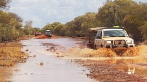 Alan takes the Landcruiser through the creek