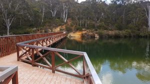 Walkway across the swimming hole.