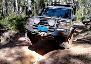 Mushy's Troopy lifts a wheel.
