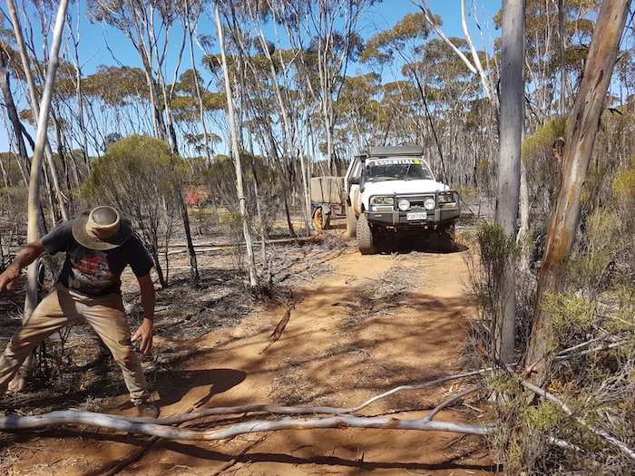 Greg clearing the Track for Corey to get through.