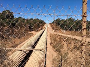 Scarp Road goes over the bauxite conveyor.