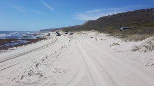 Returning from the end of the beach.