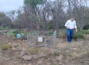 Aaron at the grave of John Paul Brooks and his mother Emily Henrietta Brooks.