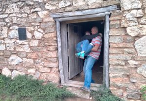 Jo gets carried across the threshhold.