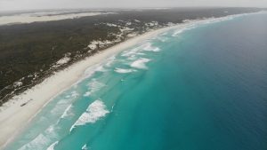 Vehicle lineup on Qualilup Beach.