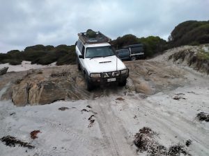 Howezit takes his Patrol over the rock ledge.