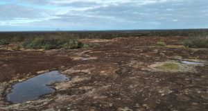 Peak Charles can be seen in the distance. It is about 35 kilometres away.