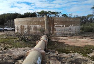 The source of the water inflow is higher than the side of the tank.