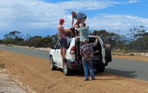 Repacking Jo and Andrew's swag on the roofrack.