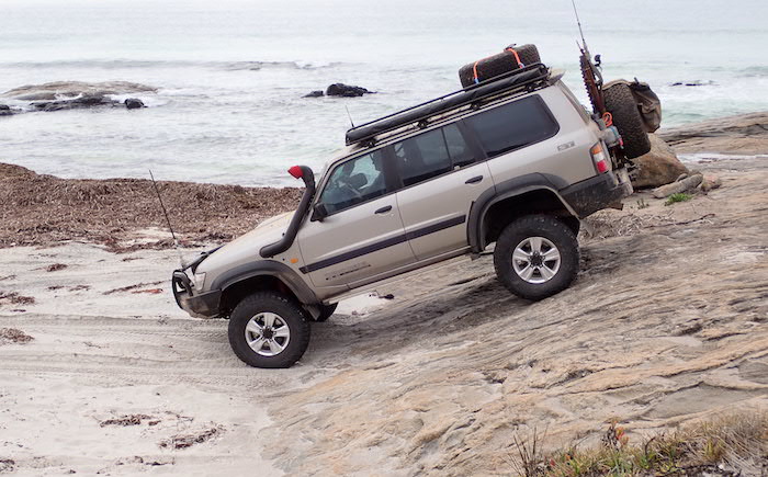 Scott takes his Patrol onto the beach.