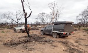 Winding through burnt out country to get around fallen trees.