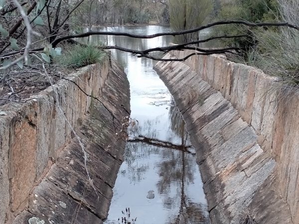 Channel from upper reservoir to main reservoir.